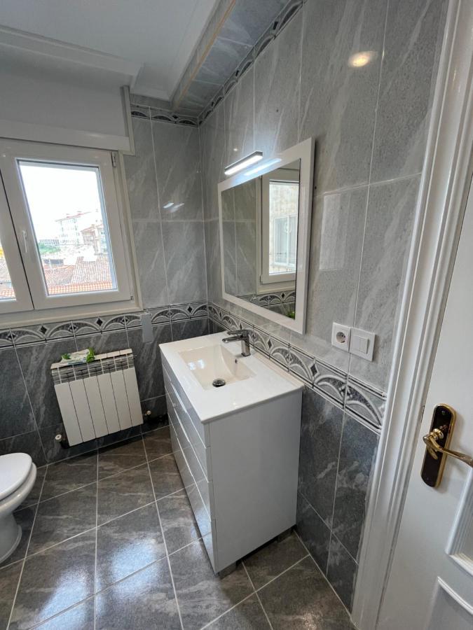 Apartamentos C&E ハーロー エクステリア 写真